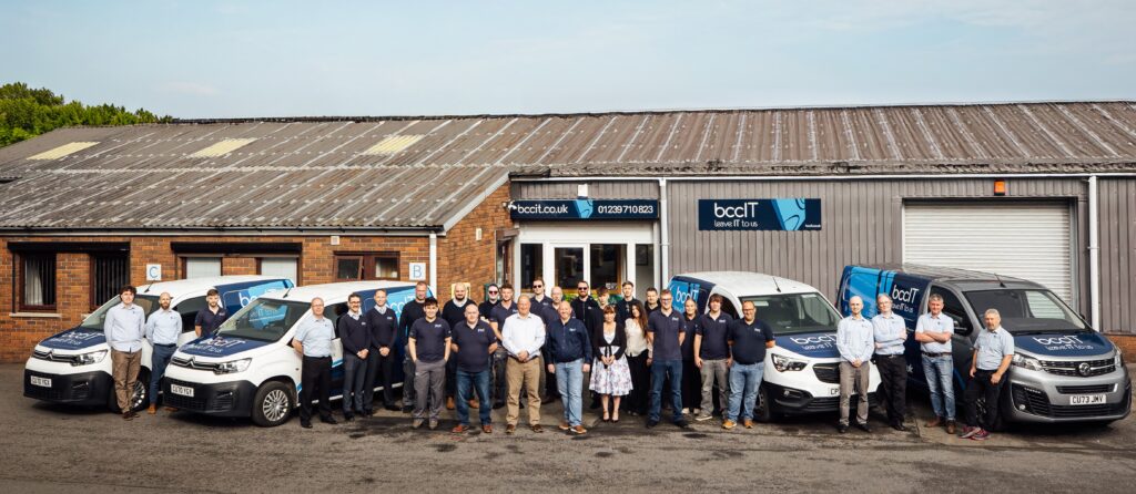 The BCC IT team outside the office in September 2025, celebrating milestones and delivering IT support in Wales and UK
