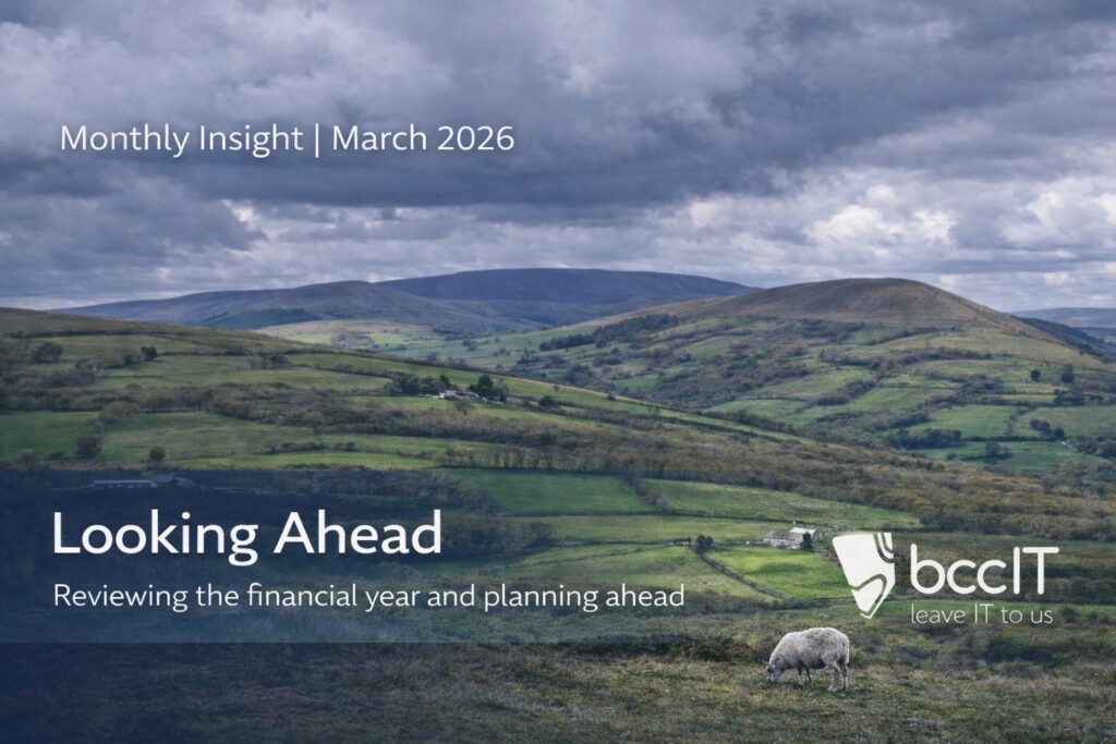 Welsh countryside landscape with sheep overlooking rolling hills, representing IT support in Wales and financial year review and planning ahead